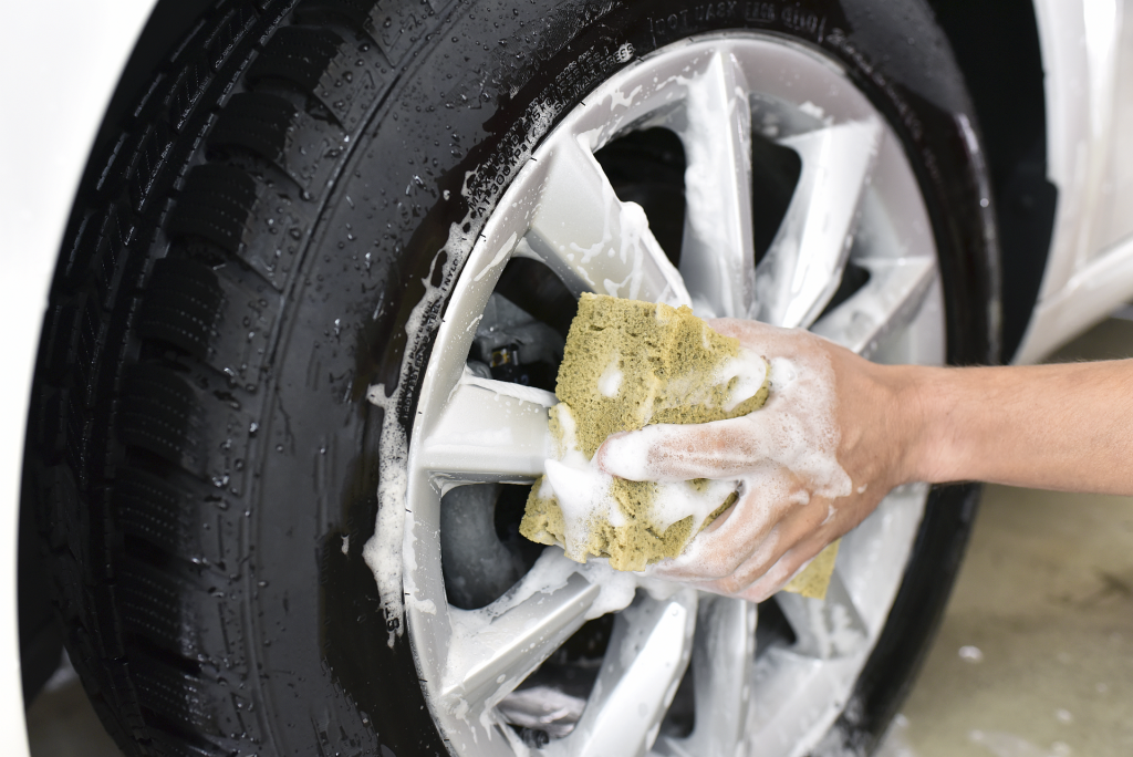 car-cleaning-man-cleaning-car-washing-the-alloy-wheel